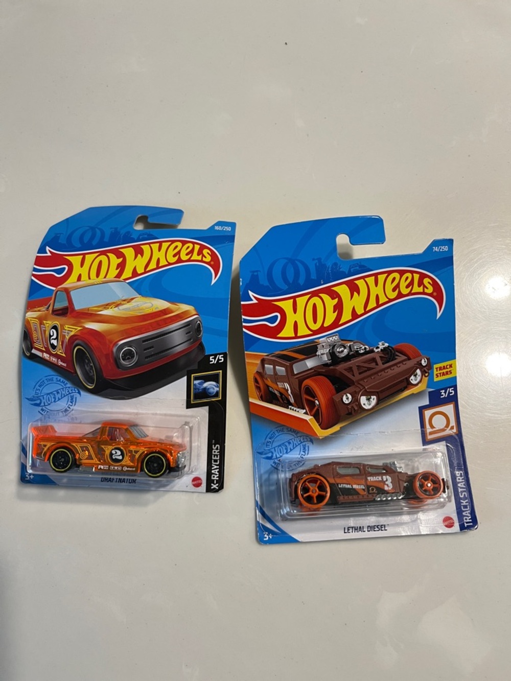 Hot Wheels toy cars (2)